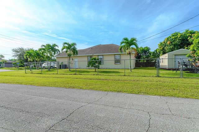 1518 SW Hutchins Street, Port St. Lucie, FL 34983