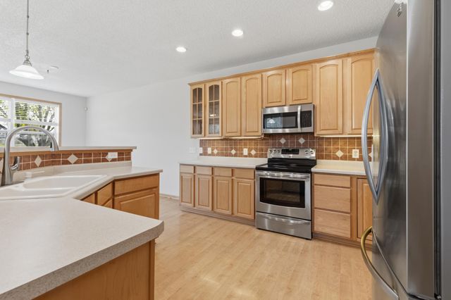 11379 Chisholm Circle NE F, Blaine, MN 55449
