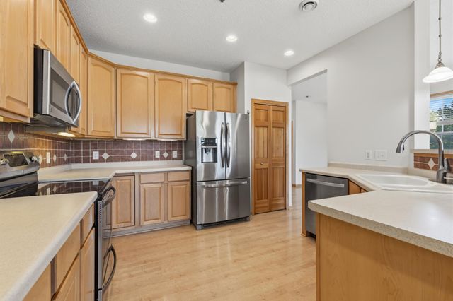 11379 Chisholm Circle NE F, Blaine, MN 55449