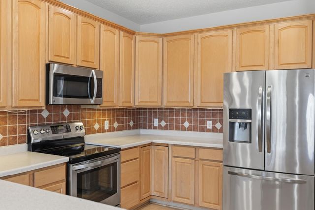 11379 Chisholm Circle NE F, Blaine, MN 55449