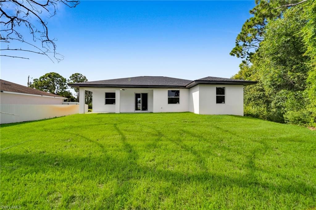 312 Harrison DR, LEHIGH ACRES, FL 33936 — photo 2