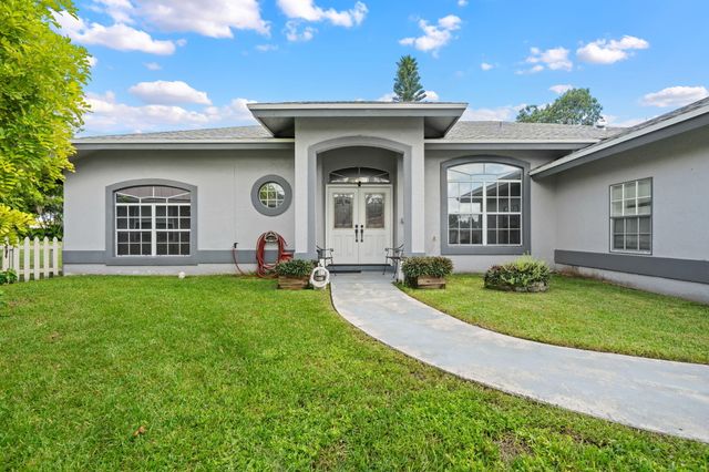 117 Hemingway Court, Royal Palm Beach, FL 33411