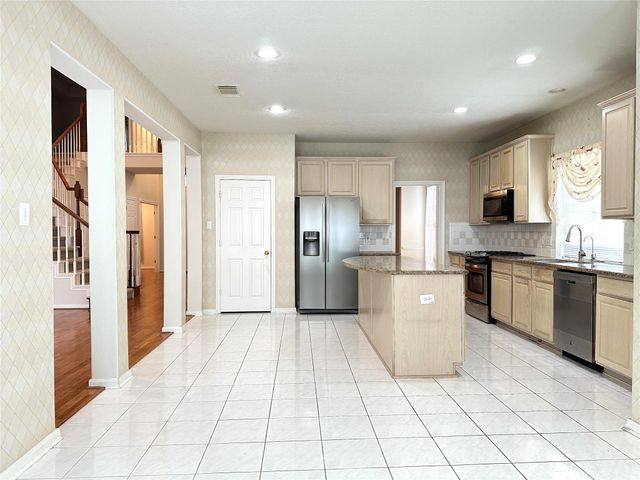12009 Pine Brook Drive, Stafford, TX 77477