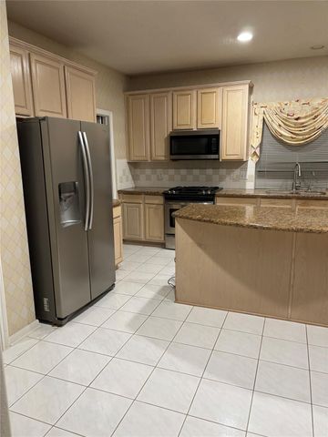 12009 Pine Brook Drive, Stafford, TX 77477