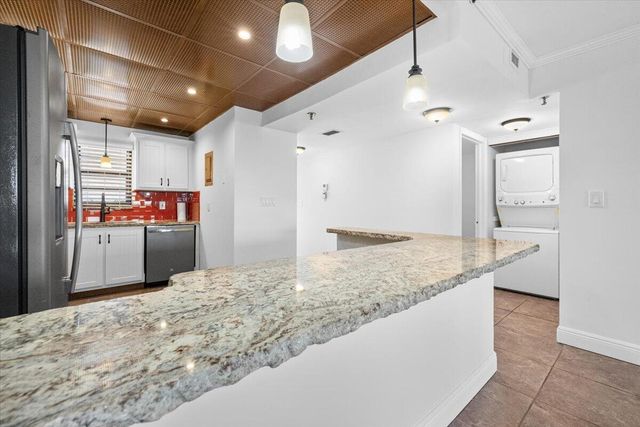 2430 DEER CREEK COUNTRY CLUB Boulevard 506, Deerfield Beach, FL 33442