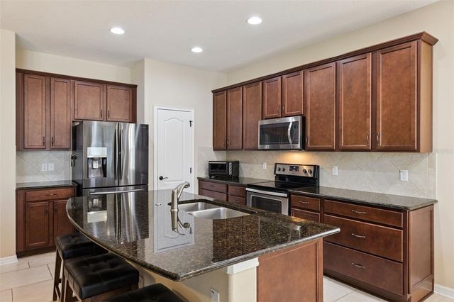 5017 TORCHWOOD DR, Minneola, FL 34715