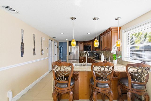 7102 HARBORHILLS COURT, Tampa, FL 33615