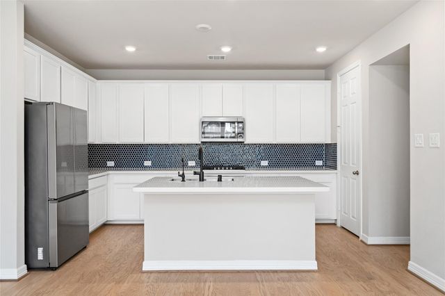 9406 Caddo Ridge Lane, Cypress, TX 77433