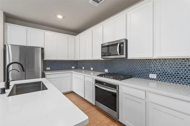 9406 Caddo Ridge Lane, Cypress, TX 77433