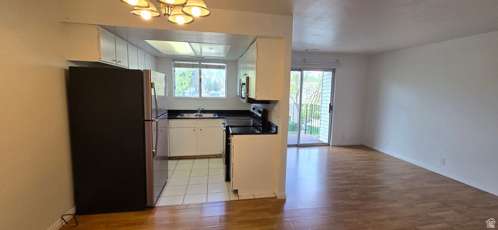 Image 4 of property listing at 1030 E QUAIL VISTA CT #K, Millcreek, UT 84117