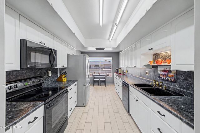 10030 W DESERT ROCK Drive, Sun City, AZ 85351