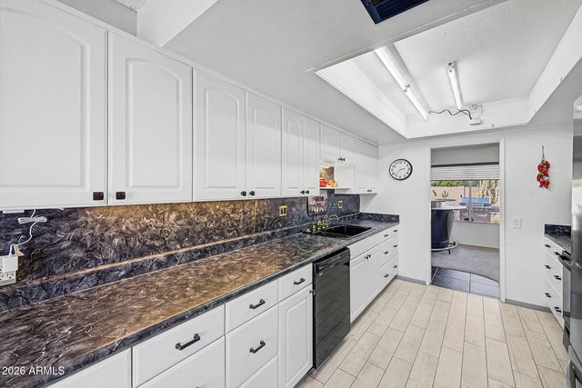 10030 W DESERT ROCK Drive, Sun City, AZ 85351