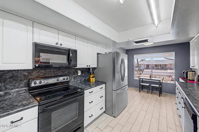 10030 W DESERT ROCK Drive, Sun City, AZ 85351