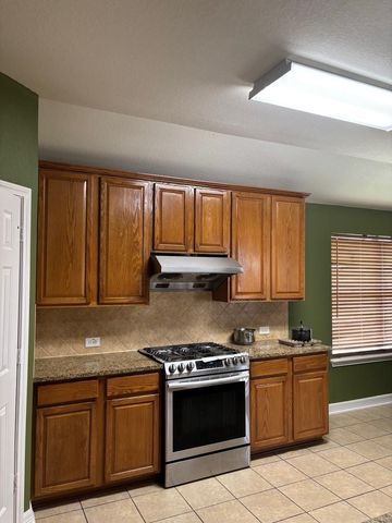 702 Hollyhock Drive, Stafford, TX 77477