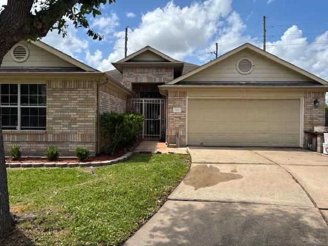 702 Hollyhock Drive, Stafford, TX 77477
