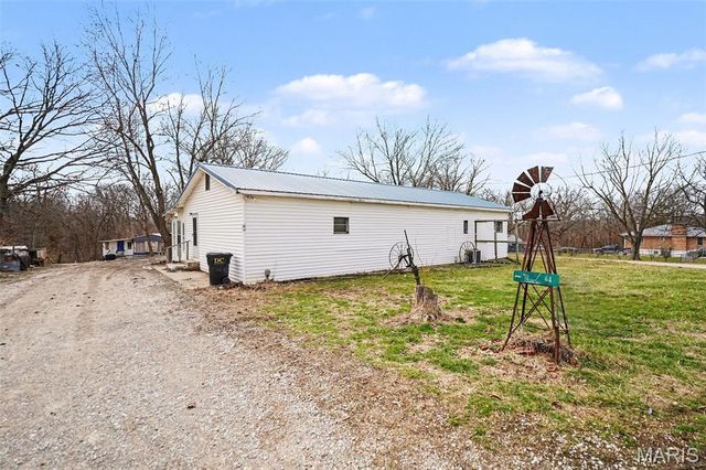 64 Mocking Bird Lane, Hawk Point, MO 63349