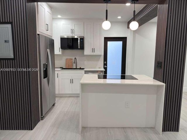 854 NW 76th St ., Miami, FL 33150