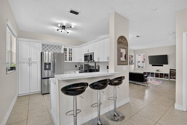 490 NW 102nd Ter, Pembroke Pines, FL 33026
