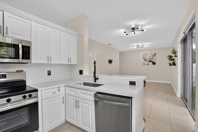 490 NW 102nd Ter, Pembroke Pines, FL 33026