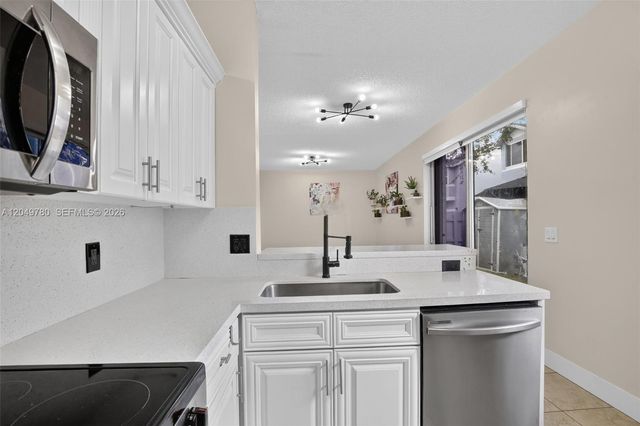 490 NW 102nd Ter, Pembroke Pines, FL 33026