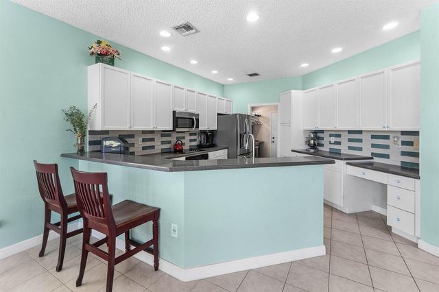 2129 RESTON Circle, Royal Palm Beach, FL 33411