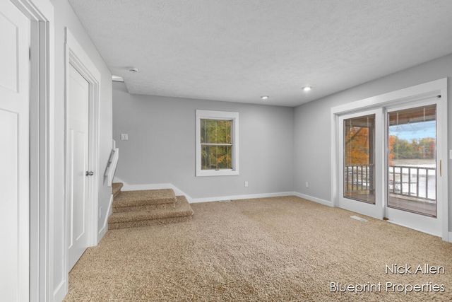 7093 Peninsula Drive NE, Rockford, MI 49341