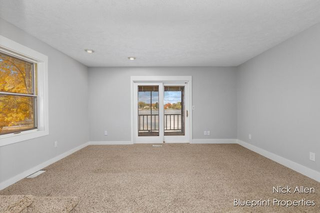 7093 Peninsula Drive NE, Rockford, MI 49341