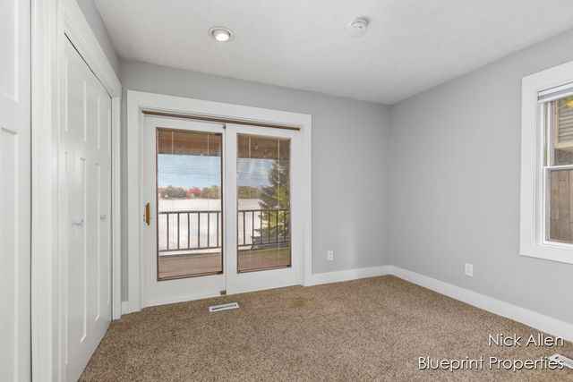 7093 Peninsula Drive NE, Rockford, MI 49341