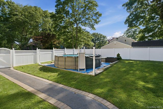 28 Cedar Heights Drive, Ridge, NY 11961