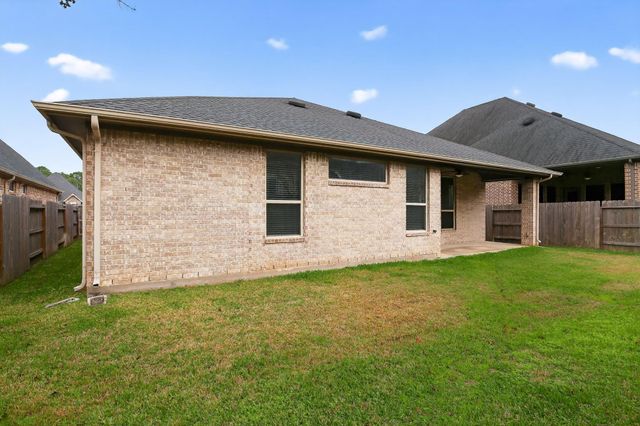 506 Blossom Cove Court, Pinehurst, TX 77362