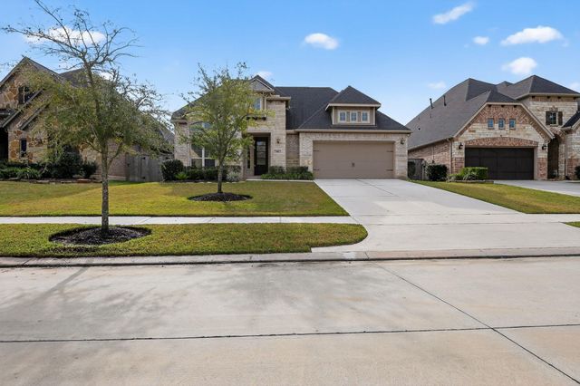 506 Blossom Cove Court, Pinehurst, TX 77362