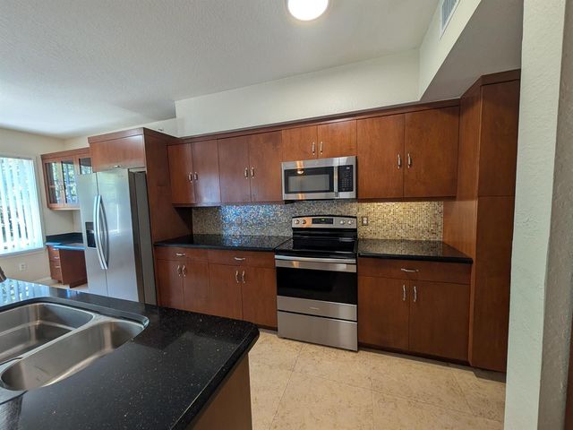 6966 W Sample Road 6966, Coral Springs, FL 33067