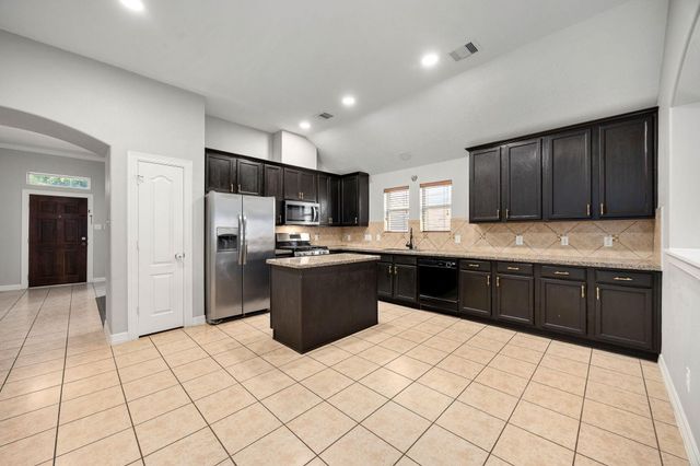 11010 Starling Creek Drive, Richmond, TX 77406