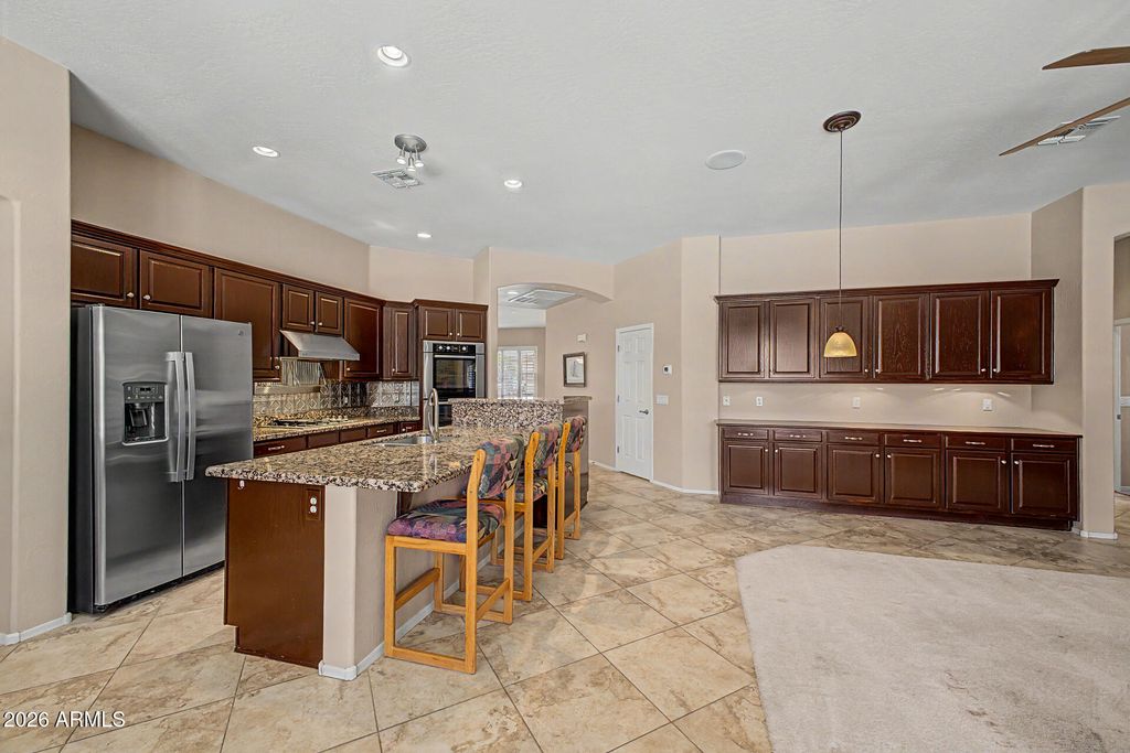 Image 11 of property listing at 9749 W BENT TREE Drive, Peoria, AZ 85383