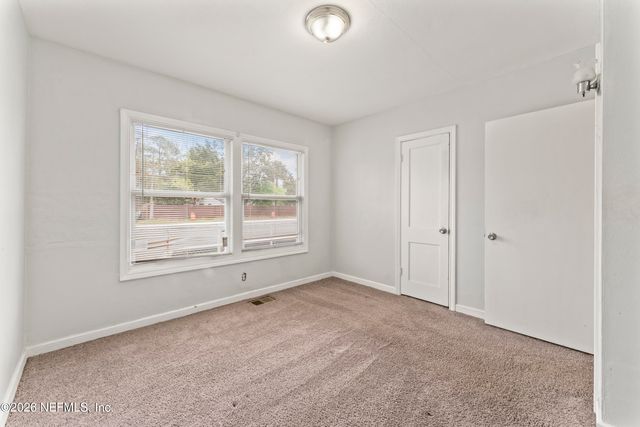 4616 TIMUQUANA Road, Jacksonville, FL 32210