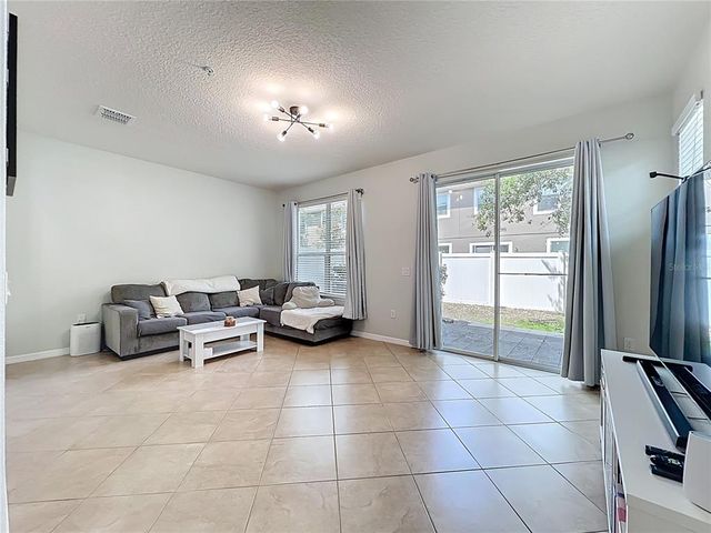 9575 SILVER BUTTONWOOD STREET, Orlando, FL 32832