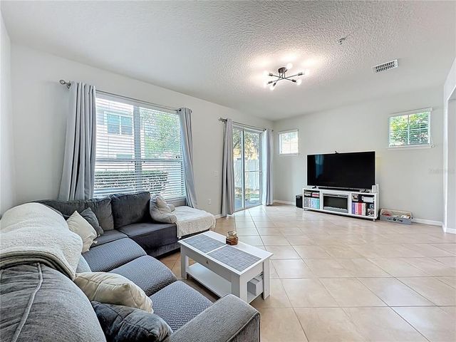 9575 SILVER BUTTONWOOD STREET, Orlando, FL 32832