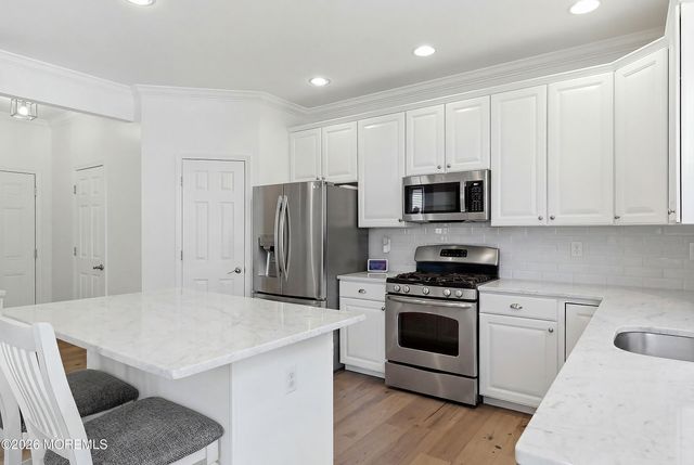 9 Nutley Drive, Manalapan, NJ 07726