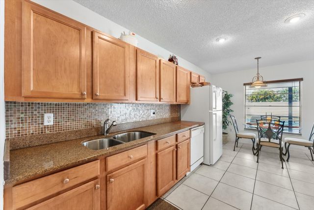 111 Madrid Street, Royal Palm Beach, FL 33411