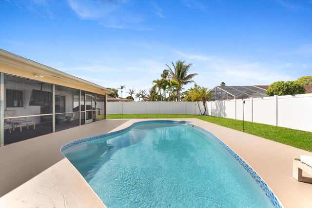 111 Madrid Street, Royal Palm Beach, FL 33411