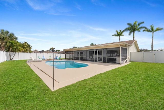 111 Madrid Street, Royal Palm Beach, FL 33411