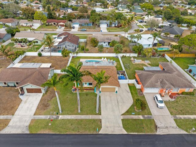 111 Madrid Street, Royal Palm Beach, FL 33411