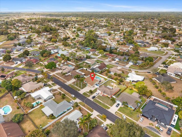 111 Madrid Street, Royal Palm Beach, FL 33411