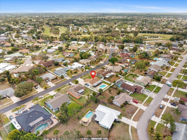 111 Madrid Street, Royal Palm Beach, FL 33411