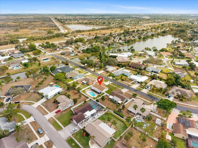 111 Madrid Street, Royal Palm Beach, FL 33411