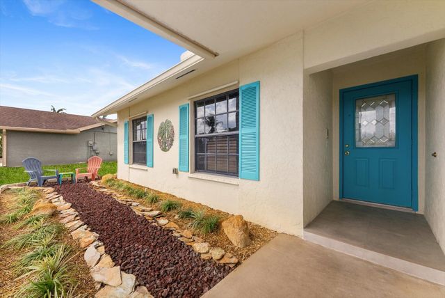 111 Madrid Street, Royal Palm Beach, FL 33411