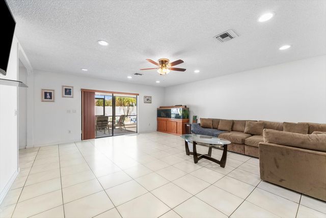 111 Madrid Street, Royal Palm Beach, FL 33411