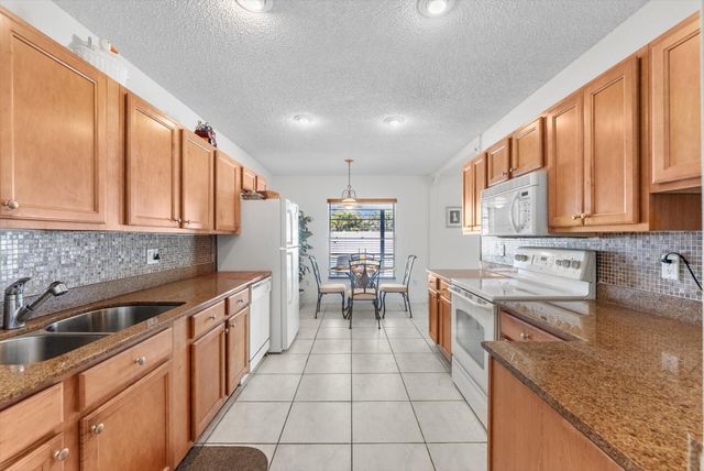 111 Madrid Street, Royal Palm Beach, FL 33411