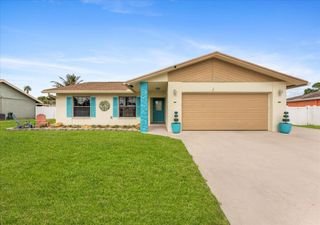 111 Madrid Street, Royal Palm Beach, FL 33411