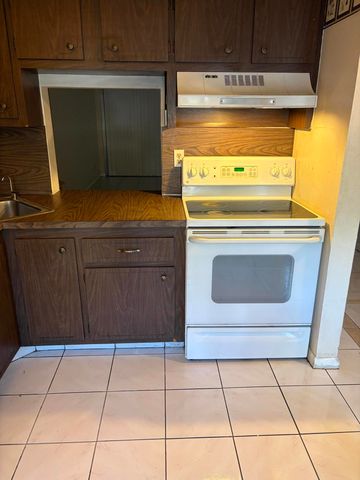 6051 NW 61st Avenue 109, Tamarac, FL 33319